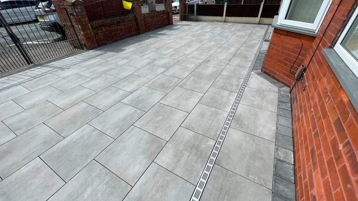 Large format grey porcelain driveway installed by RY Garden & Landscaping