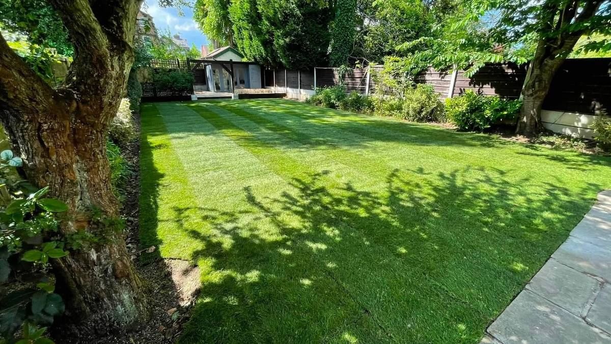 Freshly laid striped lawn installed by RY Garden & Landscaping in Manchester