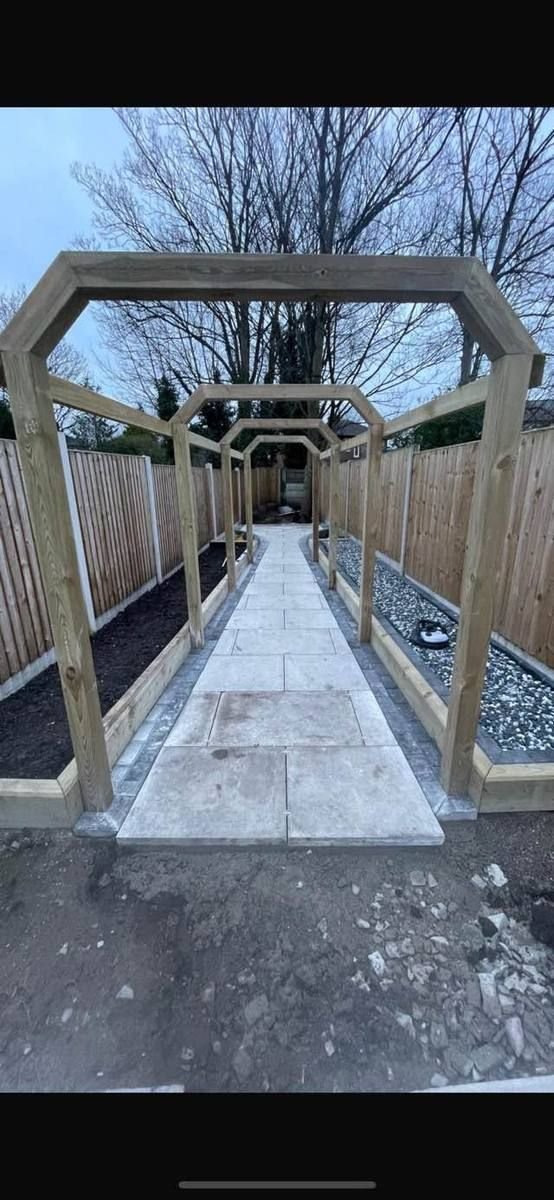 Bespoke timber pergola walkway installed by RY Garden & Landscaping